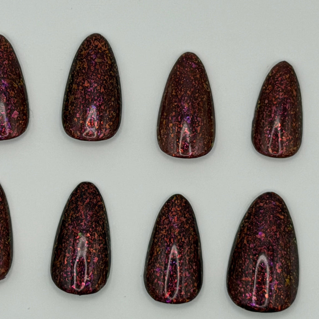 Solo Mission press-on nails featuring Holo Taco's rich earthy terracotta specialty polish, painted by smll cnvs