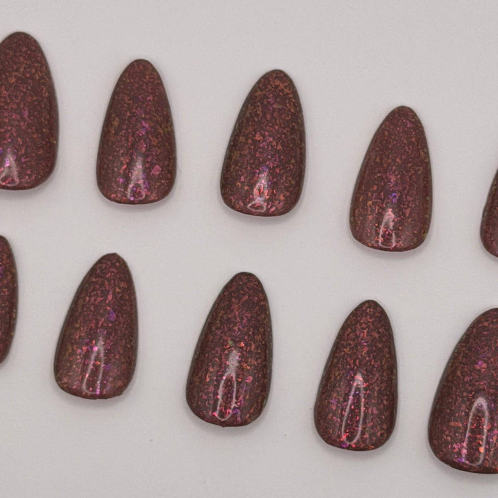 Solo Mission press-on nails featuring Holo Taco's rich earthy terracotta specialty polish, painted by smll cnvs
