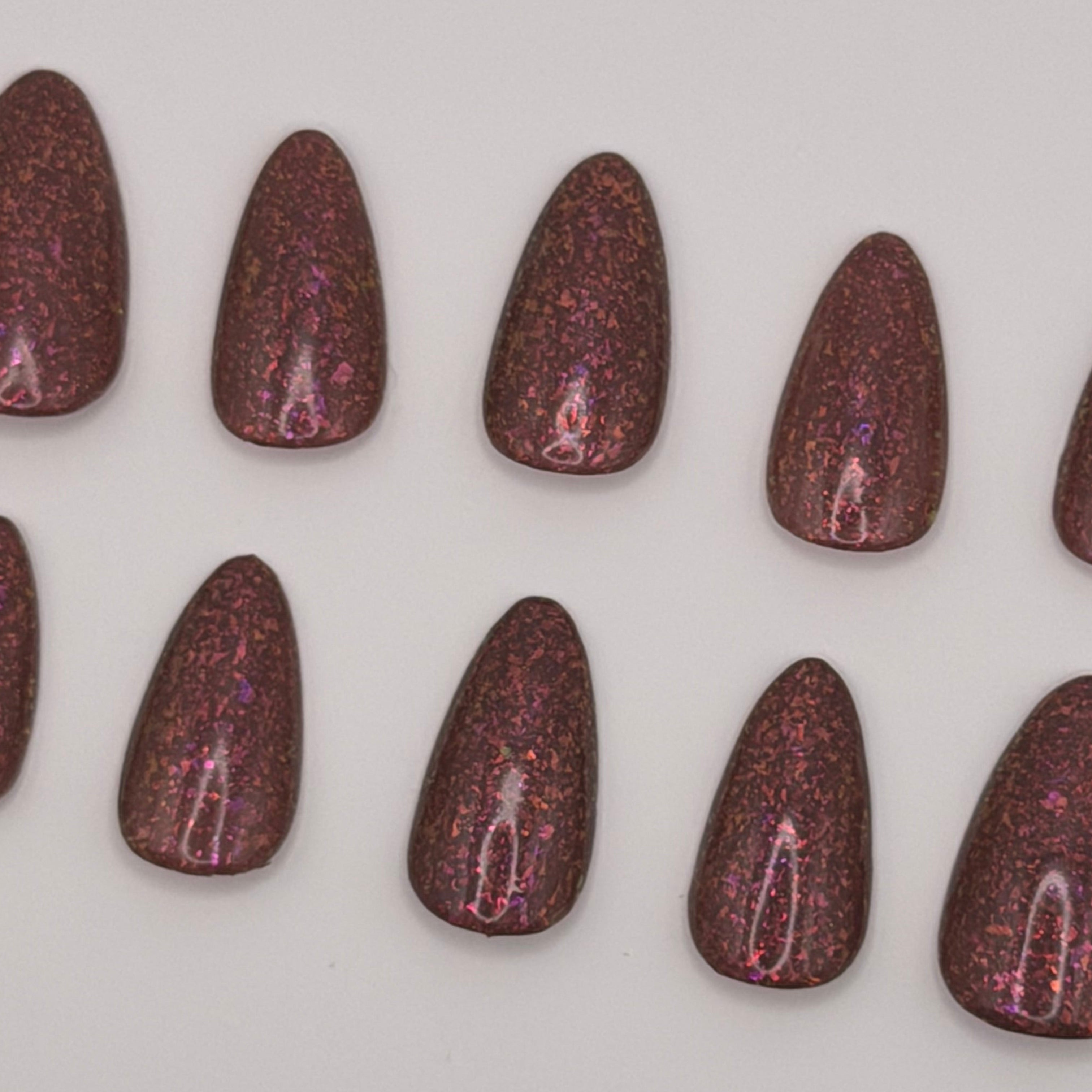 Solo Mission press-on nails featuring Holo Taco's rich earthy terracotta specialty polish, painted by smll cnvs