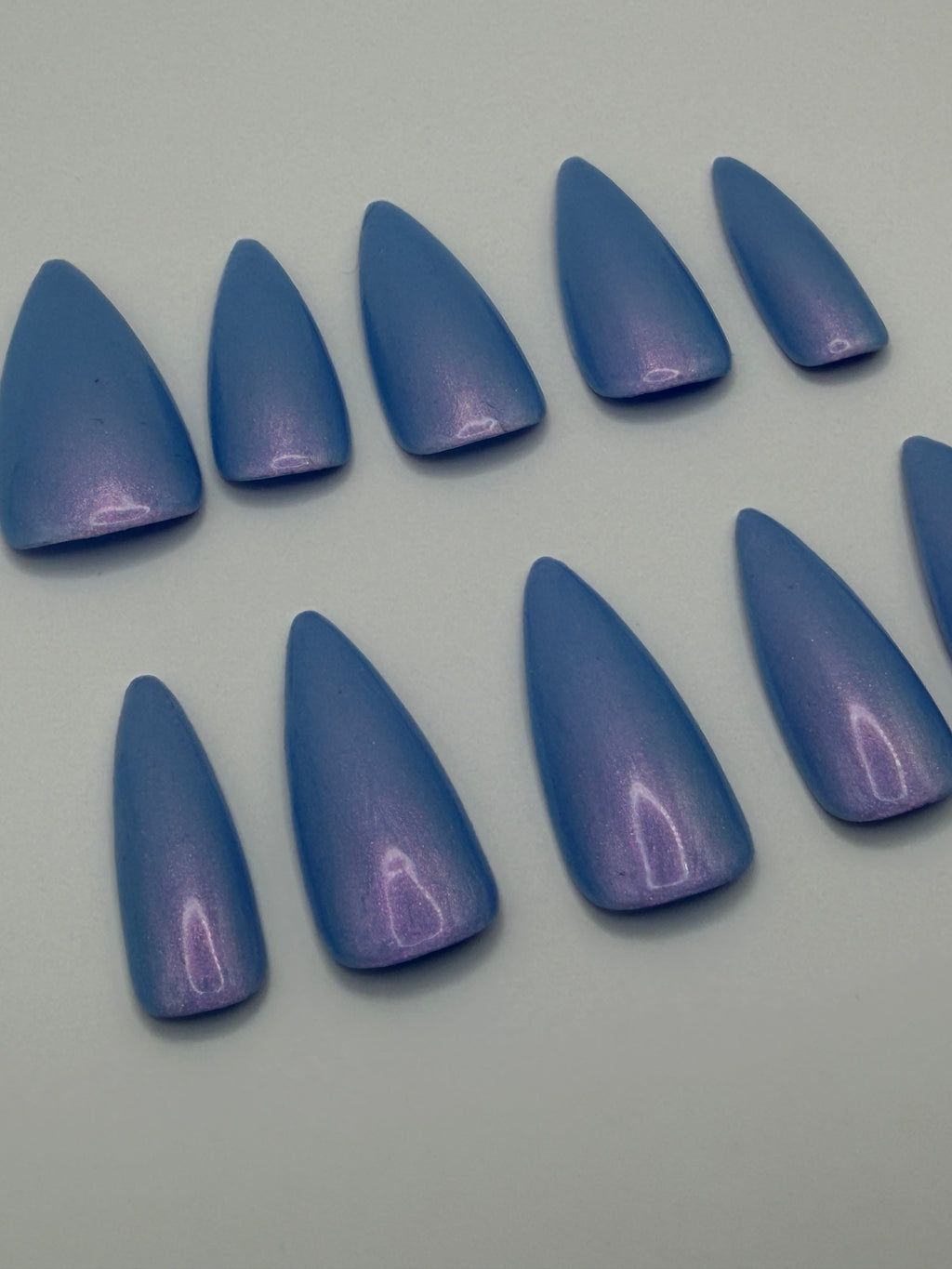 Vitamin Glow press-on nails featuring Holo Taco's deep blue-purple duochrome polish, painted by smll cnvs