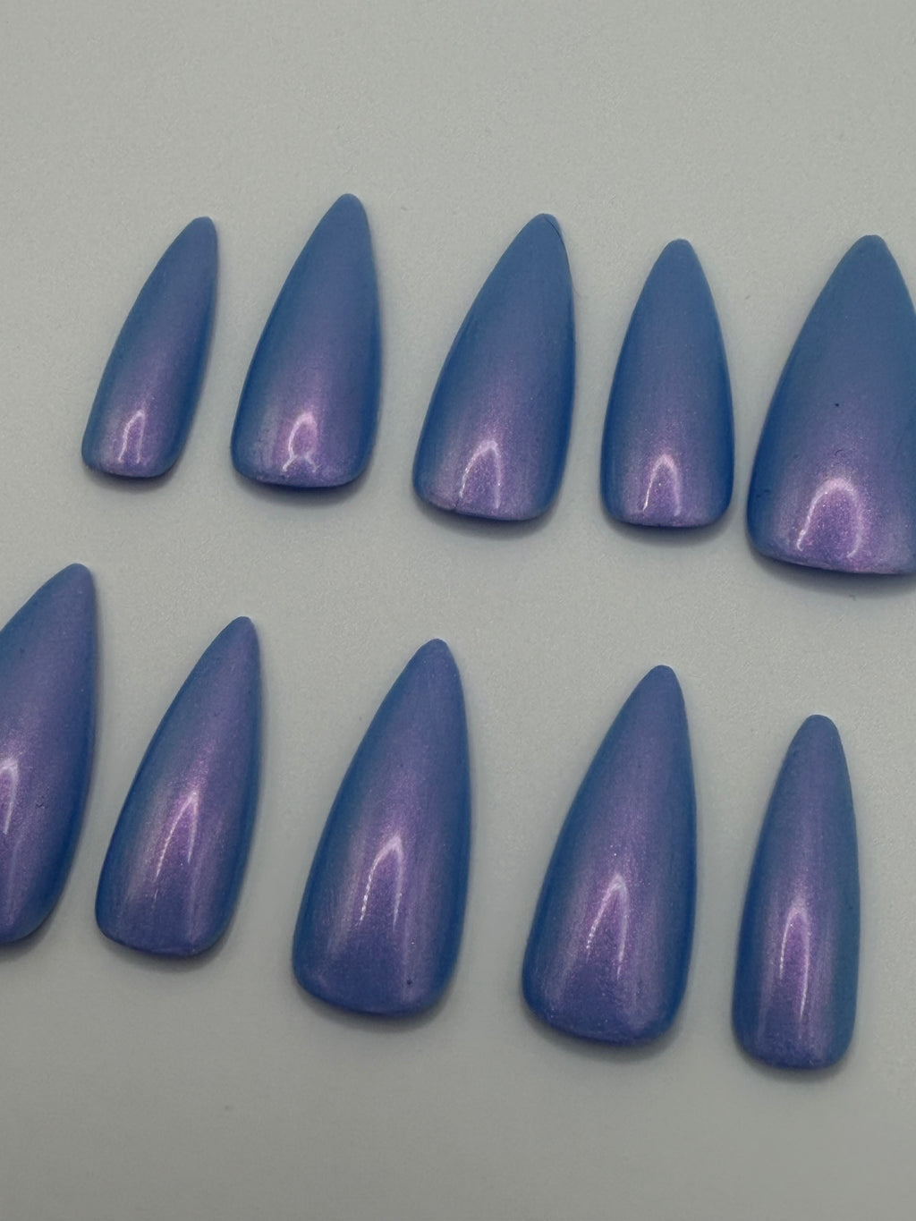 Vitamin Glow press-on nails featuring Holo Taco's deep blue-purple duochrome polish, painted by smll cnvs